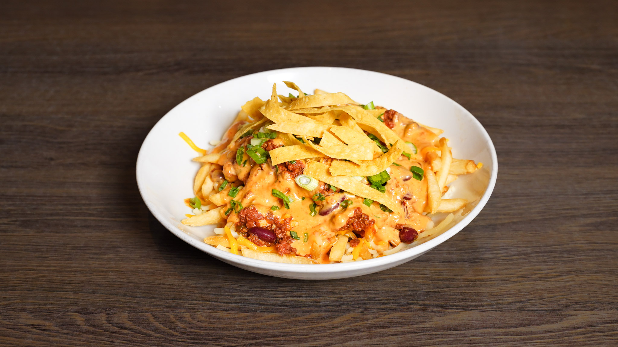 Chilli Cheese Fries at Pump House Grille Co. — loaded fries with house chilli and cheese in Port Credit