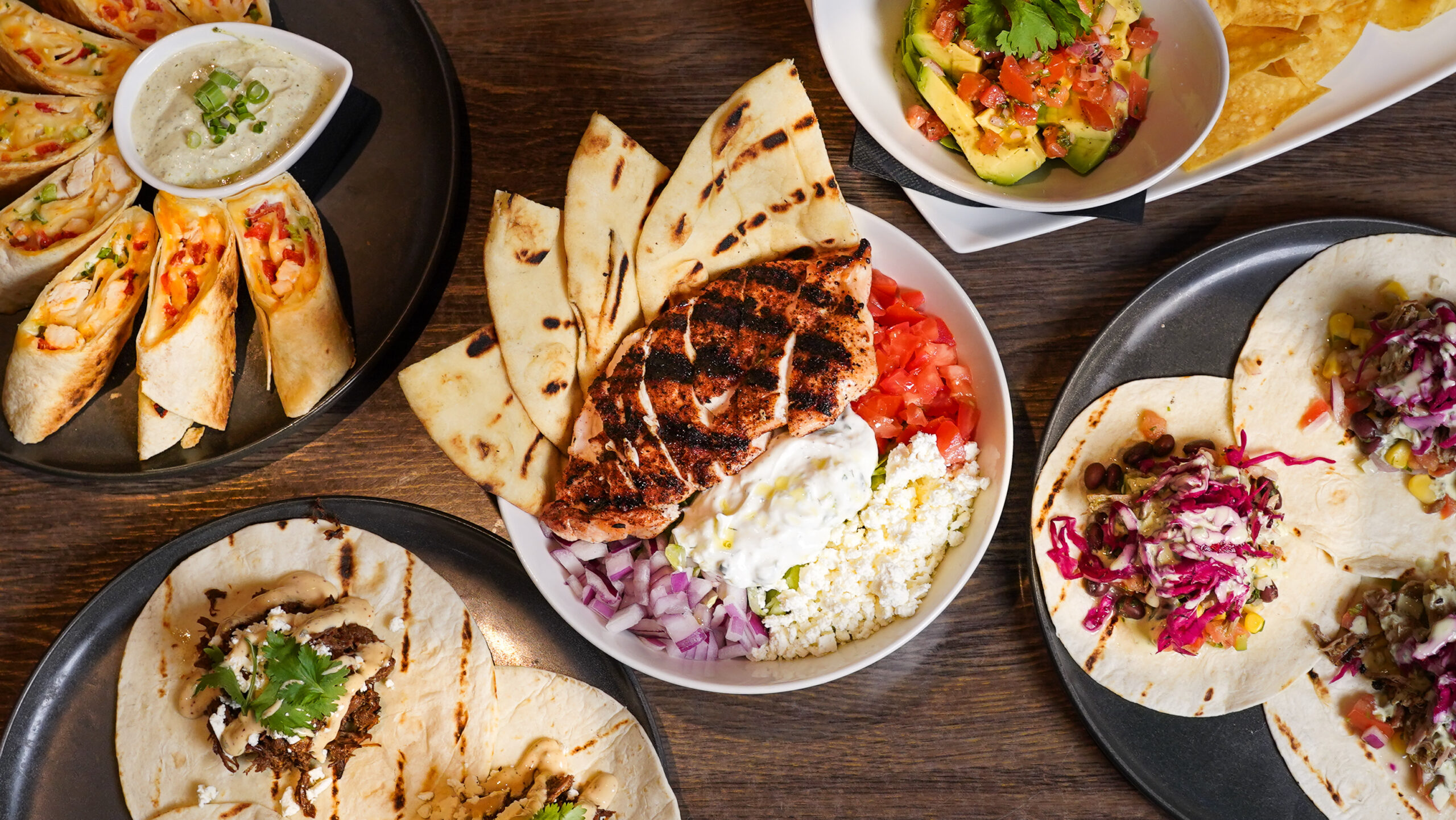 Pump House Grille Co. kitchen — open kitchen with chefs preparing food in Port Credit, Mississauga